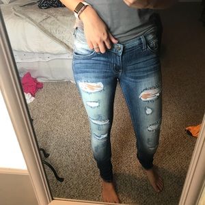 Buckle distressed jeans